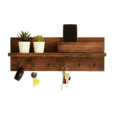 Puidust maalähedase sissepääsu võtmehoidja seinale